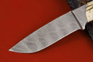 Full integral hunting knife with Damascus blade